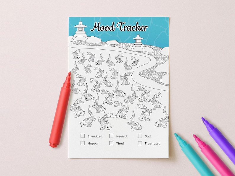 May include: A white mood tracker sheet with a koi pond design and the words "Mood Tracker" at the top. A red marker is next to the sheet, with other colored markers in the background. The tracker has boxes to check for different moods.