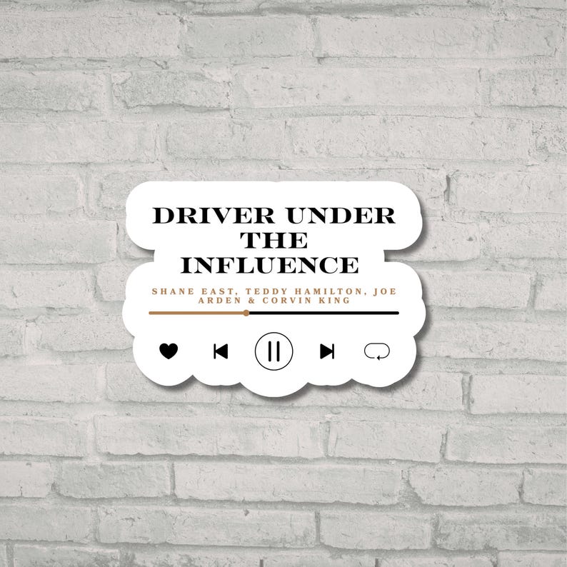May include: White sticker with the text "DRIVER UNDER THE INFLUENCE" in a music player design. Below the title are the names Shane East, Teddy Hamilton, Joe Arden & Corvin King. The sticker has a heart, rewind, pause, fast forward, and a cloud icon.