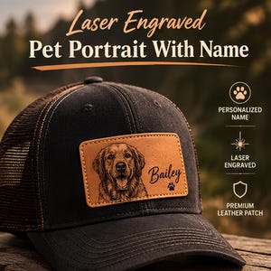 May include: A black baseball cap with a rectangular tan leather patch featuring a laser-engraved portrait of a dog and the name Bailey. The text Laser Engraved Pet Portrait With Name appears above the cap, with icons for name, laser, and patch.