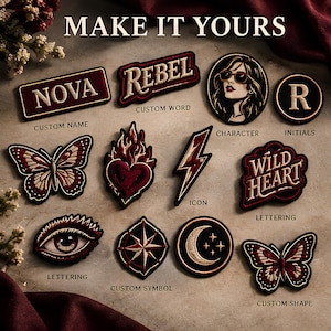 Puede incluir: Una colección de parches bordados con varios diseños, incluyendo los textos NOVA, REBEL y WILD HEART, una mariposa, un corazón en llamas, un rayo, un ojo, una brújula, una luna creciente y el retrato circular de una persona.