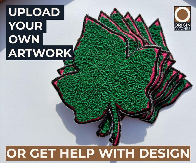 May include: A stack of green leaf-shaped embroidered patches with pink and black trim. The patches are on a white surface. Text on the image reads "UPLOAD YOUR OWN ARTWORK" and "OR GET HELP WITH DESIGN". The Origin Patches logo is in the upper right corner.