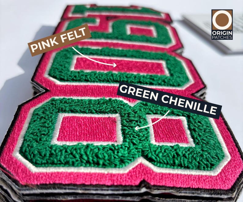 May include: Close-up of stacked, embroidered patches with the number "88". The patches feature pink felt, green chenille, and white and black borders. The Origin Patches logo is visible in the upper right corner.