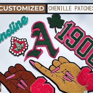 May include: A collection of customized chenille patches in various designs and colors. The patches include the word "incline" in teal, a red and white patch with a green emblem, a green and pink letter "A", a green shamrock, and a pink and green "1908" patch.