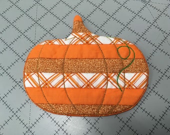 Alfombra de taza de calabaza en el aro