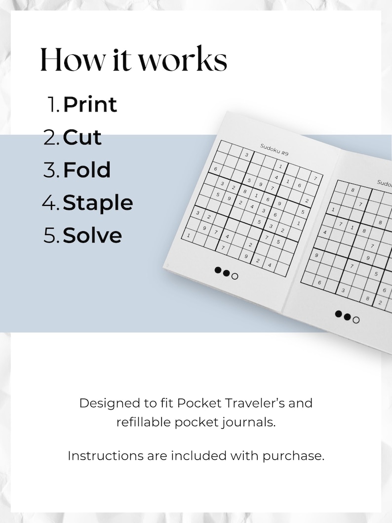 May include: A white booklet with a Sudoku puzzle open to a page with a grid of numbers. The text "How it works" is at the top, followed by numbered steps: Print, Cut, Fold, Staple, and Solve. The text "Designed to fit Pocket Traveler's and refillable pocket journals" is also visible.