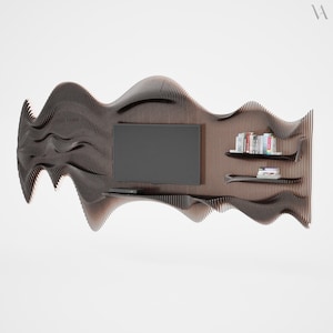 May include: A modern, dark wood entertainment center with a wavy, layered design. It features a mounted flat-screen TV, two shelves with books, and a lower shelf for media devices. The design is contemporary and artistic.