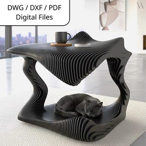 Puede incluir: Una mesa de centro negra y moderna con un diseño ondulado único. La mesa tiene una cama para gatos incorporada, donde un gato gris está durmiendo. Una taza y un plato pequeño están sobre la mesa. El texto en la imagen dice "DWG / DXF / PDF Digital Files."