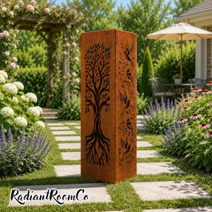 May include: A tall, rectangular, rust-colored metal garden pillar featuring laser-cut designs. One side displays a large tree with visible roots, while the adjacent side features a vertical arrangement of five birds perched among leafy branches.