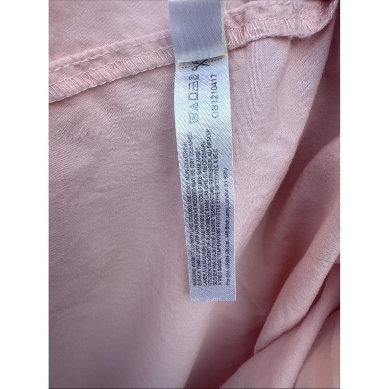 Free People Camisa rosa de manga larga con lazo en la espalda y botones imagen 8