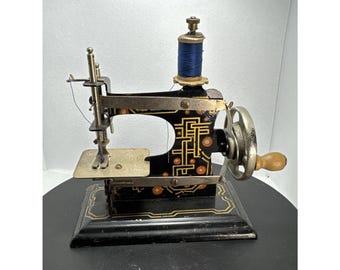 Vintage Casige miniatuur speelgoednaaimachine - Made in Germany