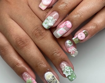 Uñas postizas pastel kawaii: diseño hecho a mano con lazos y perlas 3D