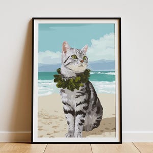 May include: Framed art print depicting a cat on a beach. The cat, with grey and white markings and green eyes, wears a green lei. The background shows a blue sky, ocean, and sandy beach.