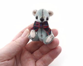 Sweet little artist bear. Hand sewn miniature teddy with tartan bow.