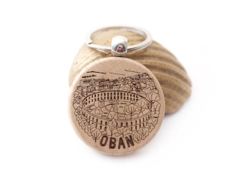 Personalised wooden keyring featuring Oban, a Scottish seaside town.