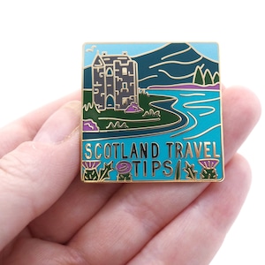 Scotland Travel Tips enamel pin. image 1