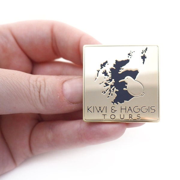 Kiwi & Haggis Tours hard enamel pin.