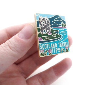 Scotland Travel Tips enamel pin. image 2