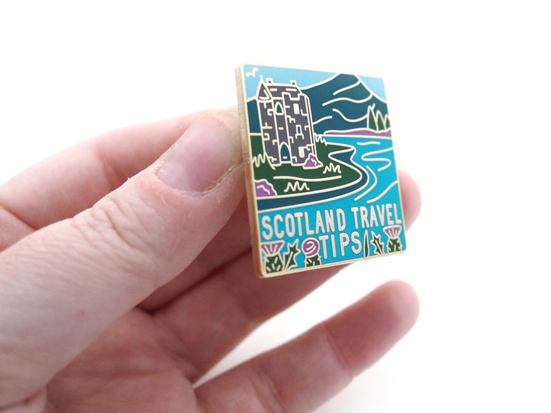 Scotland Travel Tips enamel pin. image 2