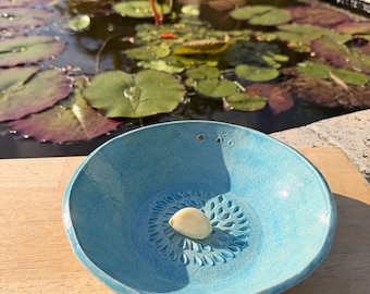 Handmade ceramic grating, herb stripper bowl. Light Blue.