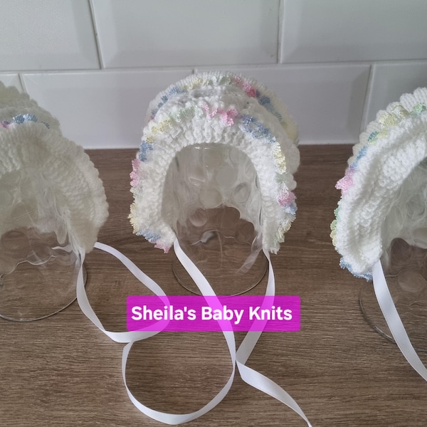 Hand knitted baby girl bonnet with lace trim, 0-3 months approximately