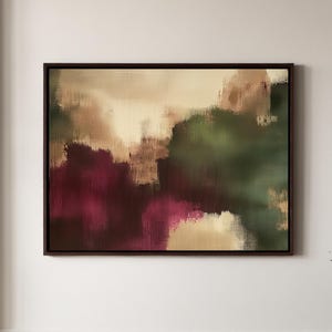 Op de afbeelding: Een rechthoekig wandkunstwerk met een abstract schilderij met gemengde streken van diepbordeaux, bosgroen en crèmekleurig beige. Het kunstwerk is gevat in een dunne, donkerbruine houten lijst en toont een zacht, getextureerd kleurenpalet.