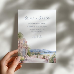May include: A wedding invitation card featuring dark blue text reading Emma & Jason, Saturday, June 15, 2029, and ceremony details. The lower portion displays a watercolor illustration of a stone terrace overlooking a lake and mountains.