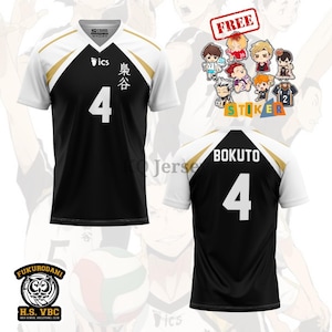 May include: Black and white volleyball jersey with gold accents, featuring the number 4. The front has Japanese text and the logo "ics". The back displays "BOKUTO" and the number 4. Includes a "FREE" sticker sheet with cartoon characters.