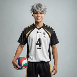 May include: A person wearing a black, white, and gold volleyball jersey with the number 4. The jersey has Japanese text and a logo. The person is holding a multi-colored volleyball.