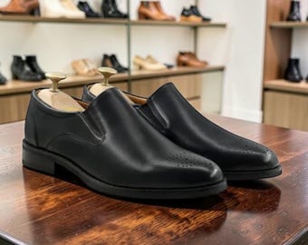 Zwarte leren brogue loafers voor heren – handgemaakte instapschoenen in mocassinstijl