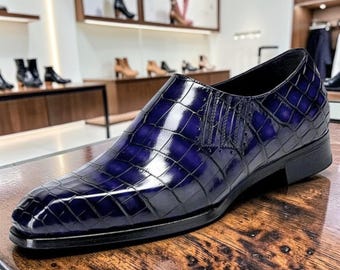Handgemaakte blauwe mocassins van getextureerd leer voor heren – stijlvolle instapschoenen voor zakelijk gebruik