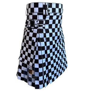 May include: A black and white checkered kilt with pleats. The kilt has a buckle closure and pockets. The kilt is made of a sturdy material and is designed for traditional wear. The kilt has the text "Highland Kilt Outfit".