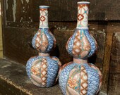 Pair of 8 Japanese hand painted vases.