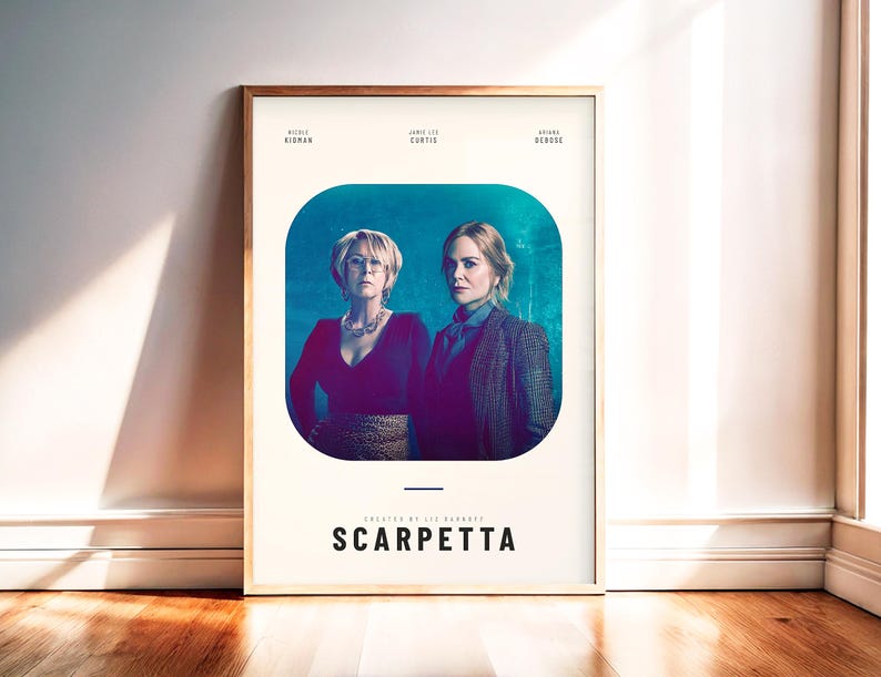 May include: Framed poster featuring two women in a teal and purple background. The poster has the title "SCARPETTA" in white text. The names "Nicole Kidman", "Jamie Lee Curtis", and "Annabeth Gish" are listed at the top.