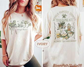 Retro Prinzessin und die Frosch Komfort Farben Shirt, Tiana Green Minnie Ohren T-Shirt, Lilien Blumen, Schleife, Froschkönig, Magisches Bayou Fairytale Tee
