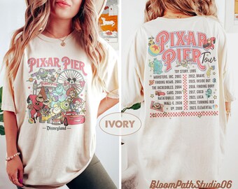 Disneyland Pixar Pier Tour T-Shirt, Disneyland Pixar Fest 2026 Shirt, Treffen Sie mich am Pixar Pier Disney Pixar Charaktere T-Shirt, Disneyland Trip Shirt
