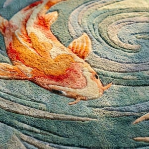 Japanese aesthetic koi fish rug with 3D textured water ripples, handmade blue and teal floor carpet.