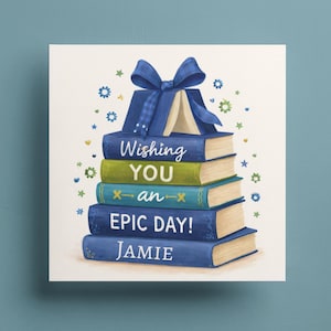 May include: A square greeting card featuring a stack of books, a blue bow, and the text "Wishing You an Epic Day! Jamie." The books are blue and green, with gold-coloured pages. Decorative stars surround the books.