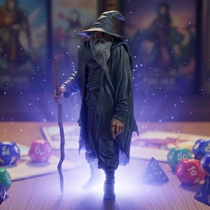 May include: A figurine of a wizard in a dark cloak and hat, holding a staff, stands amidst dice and game cards. The scene is illuminated with a blue glow, suggesting magic. Background features game boxes.