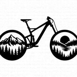 May include: Black silhouette of a mountain bike with mountain and forest scenes inside the wheels. The mountain scene features a mountain range and evergreen trees. The other wheel shows a sunset over a lake and trees.