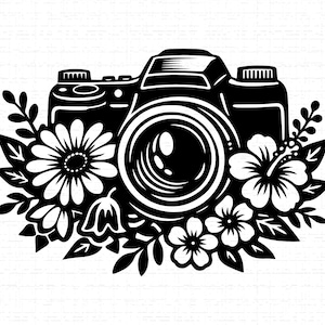 May include: Black and white illustration of a camera surrounded by floral elements. The camera is centered, with a prominent lens and detailed body. Various flowers and leaves frame the camera, creating a decorative design suitable for photography enthusiasts.