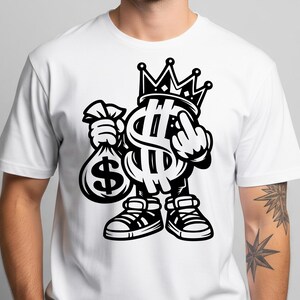 May include: White t-shirt featuring a black and white graphic of a dollar sign character wearing a crown and sneakers, holding a money bag and giving the middle finger. The design is bold and cartoonish.