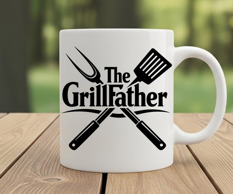 以下が含まれることがあります： 「The GrillFather」の黒い文字と、交差したグリルツールが描かれた白いセラミックマグ。 デザインにはヘラとフォークが含まれています。 マグカップは湾曲したハンドルが付いています。