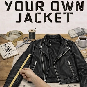 Könnte beinhalten: Schwarze Lederjacke mit silbernen Reißverschlüssen und Knöpfen. Das Bild zeigt den Text "DESIGN YOUR OWN JACKET" in fetten Buchstaben. Ein Schneider misst die Jacke mit einem Lineal, umgeben von Nähutensilien.