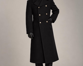 May include: A long, black, double-breasted wool coat featuring wide lapels and six gold-toned buttons arranged in two vertical rows. The coat has long sleeves, a structured collar, and a straight hemline that falls below the knees.