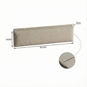 May include: A beige rectangular wall pocket, 5 cm high, with a stitched seam detail. The pocket has several small holes along the top edge for mounting. The image includes the German words "H&ouml;he" (height) and "Breite" (width).