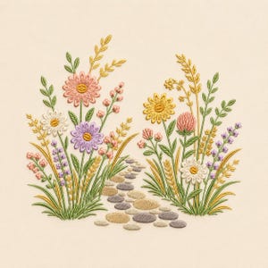 May include: An embroidery design featuring two clusters of colorful wildflowers in shades of pink, yellow, purple, and white, with green stems and leaves, separated by a winding path of small, rounded, tan and grey stones on a cream fabric.