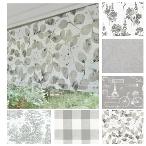 May include: A collection of fabric swatches featuring various patterns. The top left swatch displays a curtain with a gray and white leaf design. Other swatches include floral, linen, Eiffel Tower, toile, buffalo check, and leaf patterns. The fabrics are in shades of gray and white.