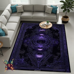 May include: A large, rectangular area rug with a dark purple and black design. The rug features a celestial-themed pattern with geometric shapes, circles, and crescent moon designs. The rug is placed on a light-colored floor, with a gray sectional sofa and a small round table in the background.