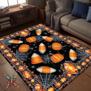 May include: Black Halloween-themed rug featuring orange pumpkins, candy corn, and spiderwebs. The rug has a decorative border with orange jewel-like accents. The design is set against a black background, creating a festive and seasonal look.