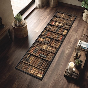 May include: A rectangular rug with a detailed print of a bookshelf filled with antique books. The rug features a dark brown border and a variety of book colors, creating a vintage aesthetic. The rug is placed on a dark wood floor.